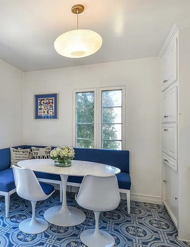 A before photo of a Spanish style dining nook before it was redesigned by Liz Zaret and A Little Sprucing